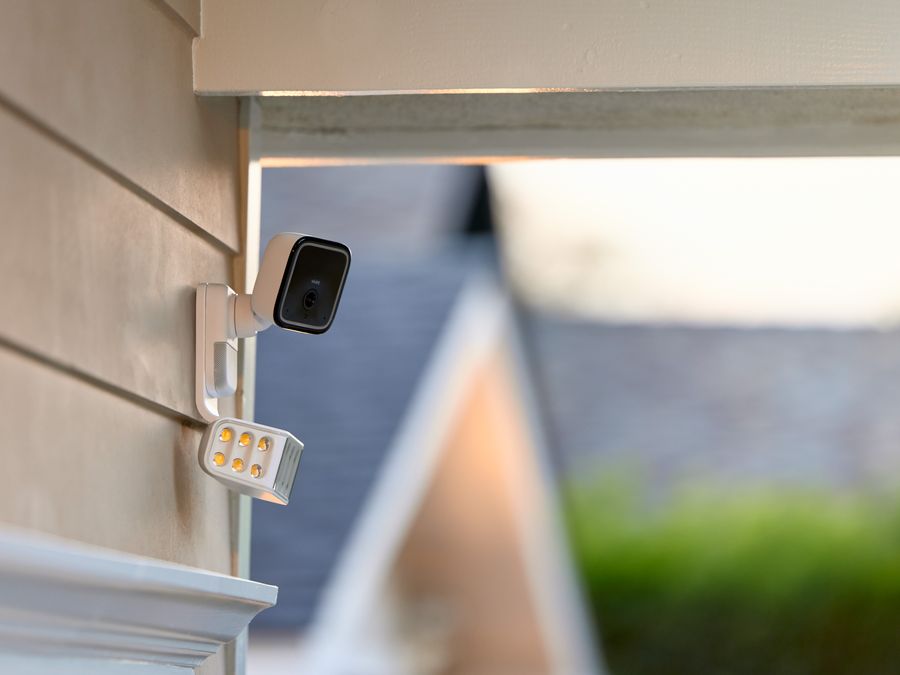 Vivint Spotlight camera mounted outside a home